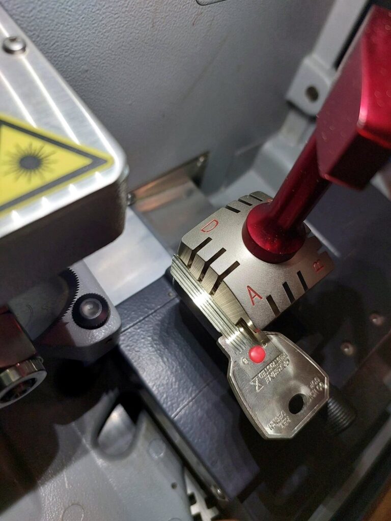 Locksmith preparing keys for master key systems Gold Coast properties