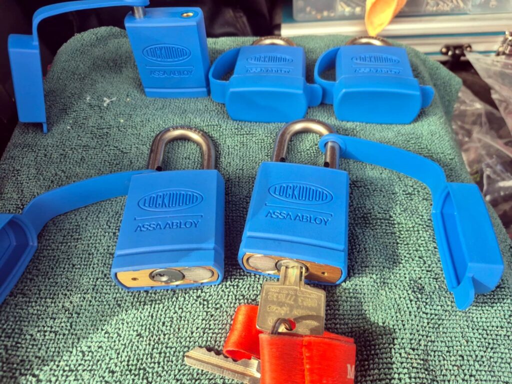 Restricted key system padlocks and controlled keys for property access