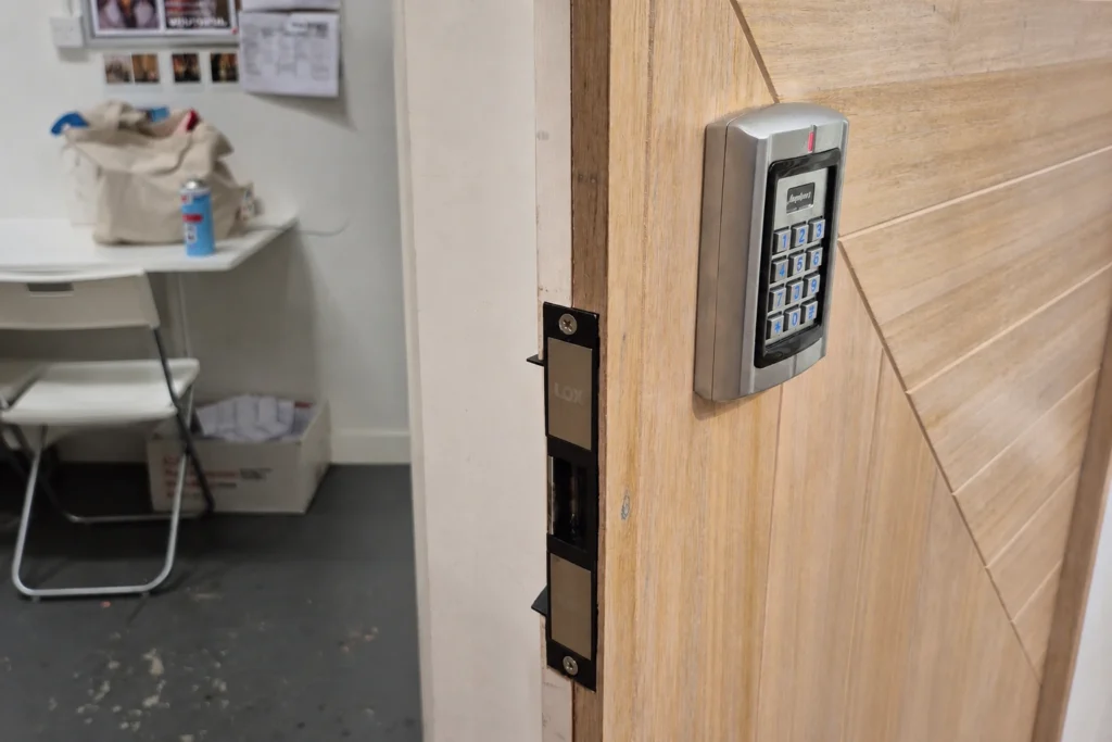 Commercial door with keypad and electric strike